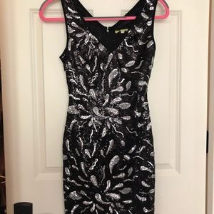 Sequined semi-fitted semi formal dress